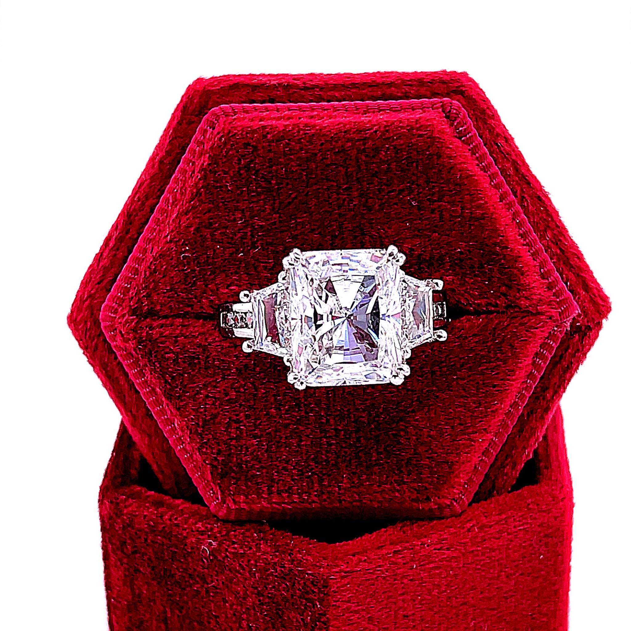 Sterling Silver Platinum Plated Radiant Cut CZ Ring with Two Trapezoids on side